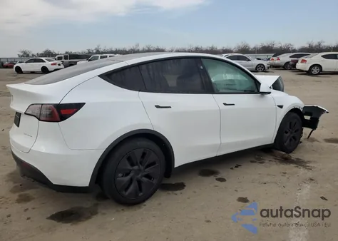 2025 Tesla Model Y из США, поврежденный, VIN 7SAYGAEE6SF268048